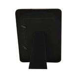 Rear view of the Floral Love Ceramic Photo Frame 6 x 4in showing its black backing, hinged fold-out stand, and metal hanging tabs on a white background.