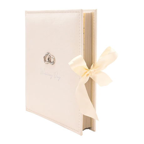 Ivory Wedding Day photo album with silver interlinked rings motif, stitched edges, and cream ribbon tie, holds 100 7 x 5in photos, on a white background.