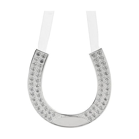 Silverplated horse shoe decoration, 9.9cm, with clear stone rows either side of an engravable plate, hung from a white ribbon on a plain background.