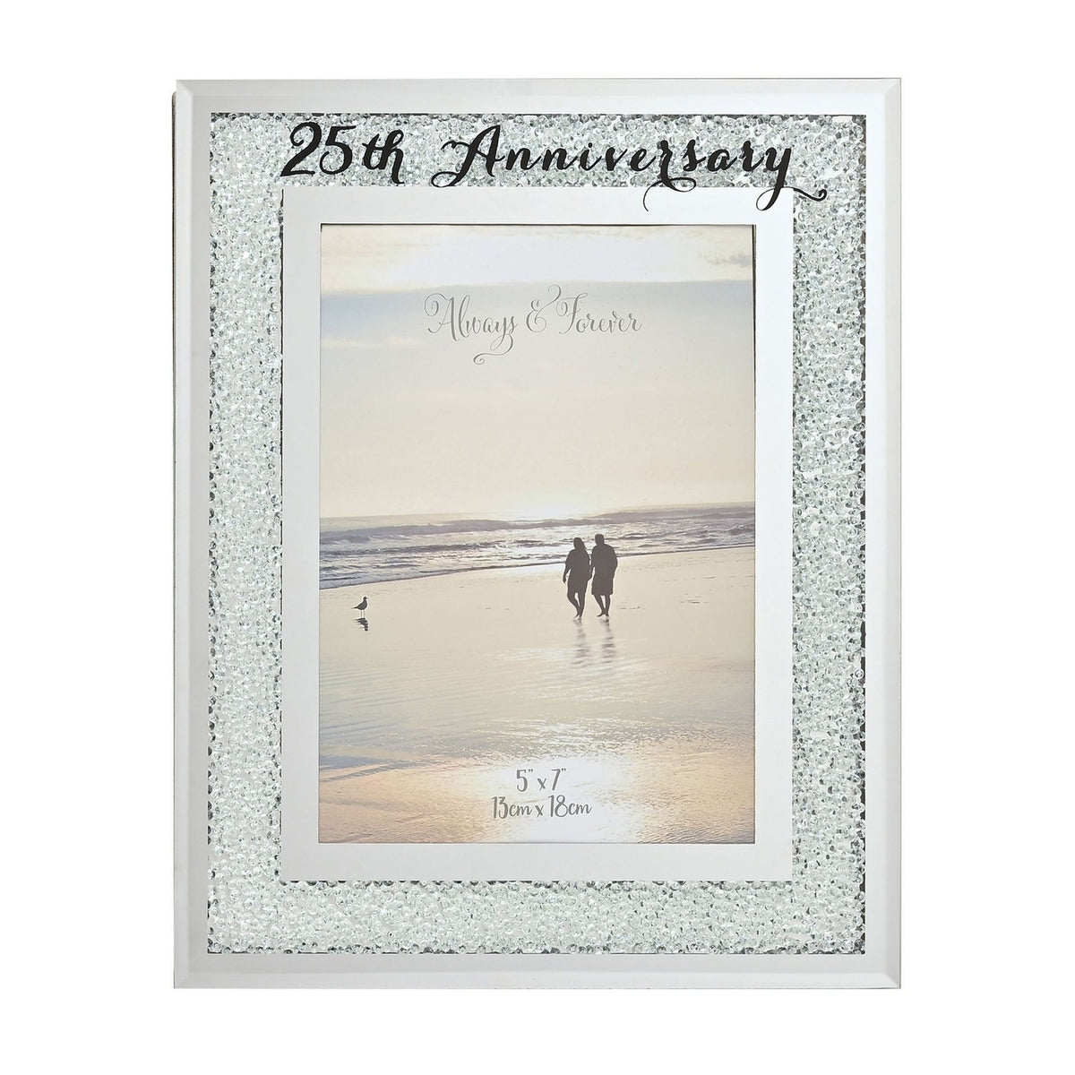 25th Anniversary photo frame with a sparkling crystal border on a silver mirror finish, white inner mat, and "25th Anniversary" script at the top, holding a 7 x 5in photo.