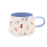 Tapered white ceramic mug with an all-over watercolour dog pattern, featuring a pale blue handle and matching interior, shown on a plain background.