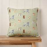 Square cushion, 42cm x 42cm, lime green with cream piped edge, patterned with dalmatians, dachshunds, chihuahuas and terriers, shown on a wooden bench.