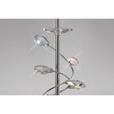 Close-up of the Willow 1 Light Crystal Table Lamp in chrome, featuring spiral metal arms with faceted crystal drops that reflect light and cast small rainbows, paired with a cream shade against a plain gray background.