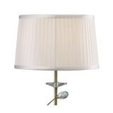 The Willow 1 Light Crystal Table Lamp features an antique brass finish, clear crystal accents near the stem, and is topped with a white pleated shade, shown here against a plain white background.