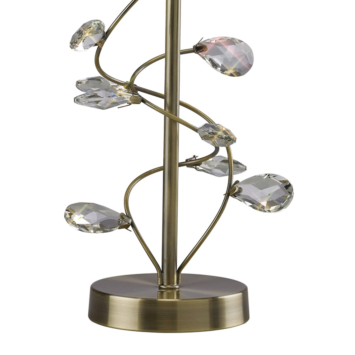 The Willow 1 Light Crystal Table Lamp in antique brass features metal branches with clear faceted crystal accents, creating an elegant, plant-inspired look. Its white shade and dimmable design add ambiance to any space.
