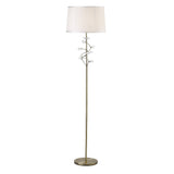 The Willow 1 Light Crystal Floor Lamp features a slender brass stand, crystal accents, round base, and a white drum shade—adding elegance to any room.
