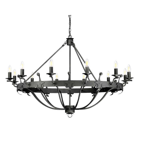 The Windsor 12 Light Chandelier - Graphite makes an impressive statement with its substantial black metal frame and graphite finish. It boasts twelve candle-shaped lights arranged evenly on a circular design, hanging from a decorative chain to provide timeless elegance in a traditional style.