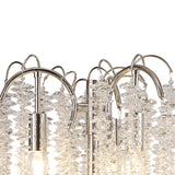 Close-up of the Wisteria 3 Light Table Lamp in nickel, featuring polished metal arches, clear crystal clusters, and partially visible bulbs for sparkling ambient lighting and an elegant, modern look.