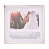Square silver metal photo frame with white mount, "Mr & Mrs" script above a 6x4in wedding photo and printed verse, accented with small gem details.