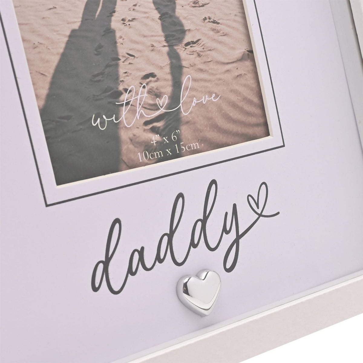White freestanding photo frame with "daddy" in script, heart details and a small silver-coloured heart accent, mount for a 6 x 4in portrait photo.