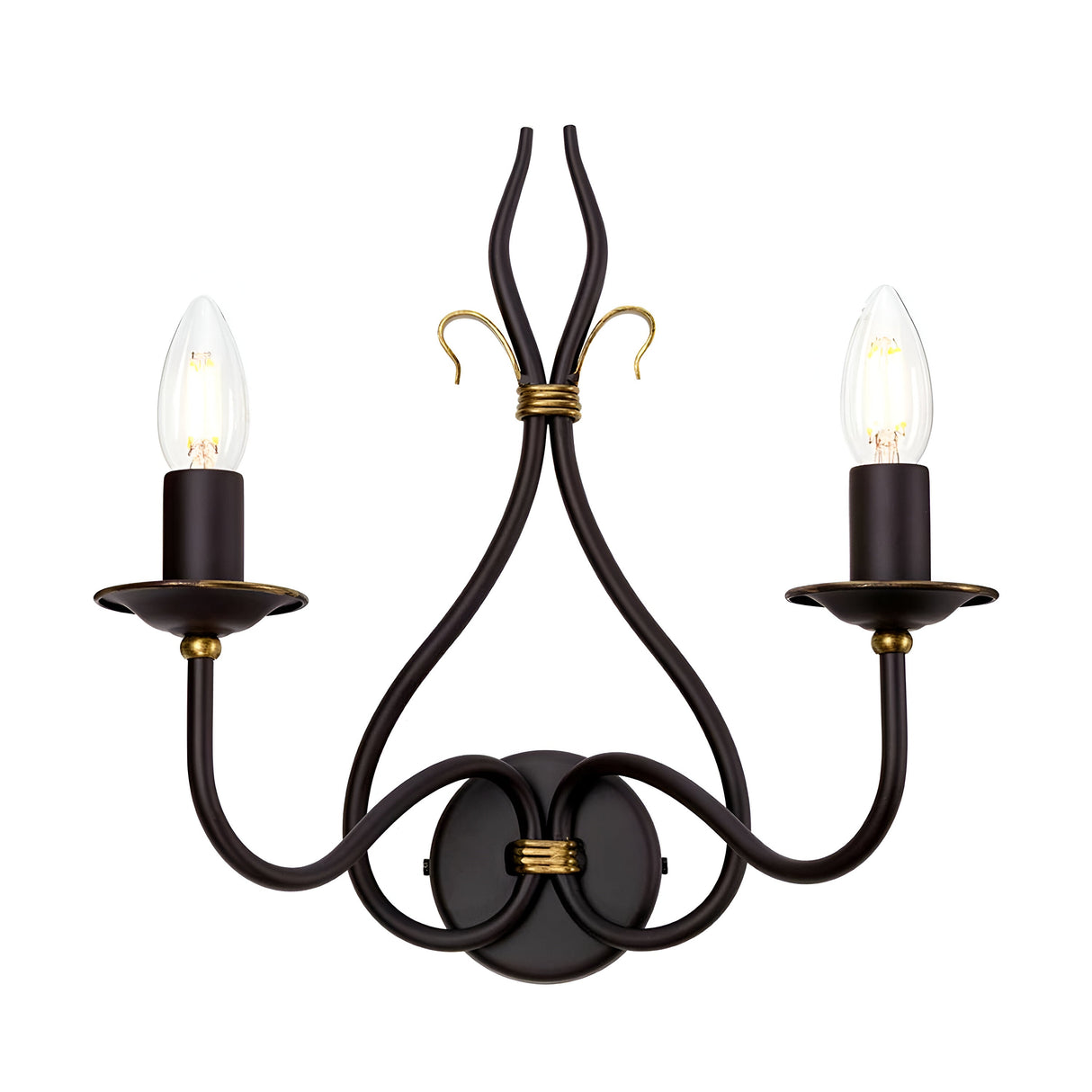 The Windermere 2 Light Wall Light in Rust/Gold is a decorative fixture featuring two candle-shaped light bulbs. Handcrafted in the UK, it is made from dark metal with elegant curves and adorned with gold accents, offering a vintage style that brings sophistication and rustic charm to any decor.