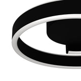 Close-up of the Andabaia Smart LED flush ceiling light in black, showing its spiral aluminium and steel band with white plastic diffuser against a plain white background.