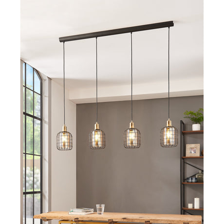 Wonenne four-light linear pendant with black wire cage shades and bronze lampholders on a black bar, hung above a wooden table in a living room.