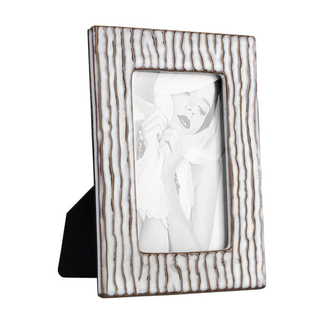 Wormiston rectangular ceramic photo frame in white and brown, with textured vertical ridged surface and stand, shown on a plain white background.