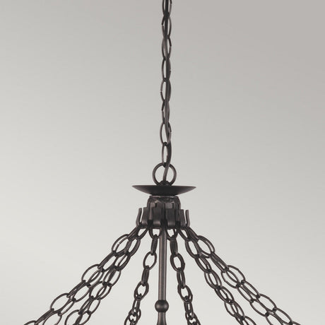 Close-up of the Warwick 12 Light Chandelier - Graphite Black, featuring multiple chains merging into a central fixture. The Graphite Black finish contrasts beautifully against the subtle light gray background, highlighting a fusion of modern and medieval artistry in its industrial design.