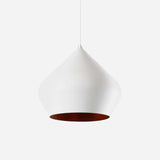 The Funk Stout Small Pendant Light in White features a teardrop-shaped design with a dark interior, elegantly suspended from a slim cord. It embodies minimalist decor against a plain white background, making it perfect for modern interiors.
