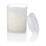 Floral Fields 1 Wick Scented Candle, round frosted glass jar with white wax and gold London skyline design, clear lid resting beside it, on a plain white background.