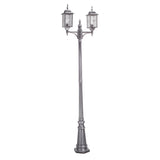 The Wexford 2 Light Lamp Post - Black/Silver is a tall, ornate street lamp with a vintage design, featuring two lanterns mounted on an intricately detailed decorative metal post. Ideal for outdoor lighting, this sophisticated fixture enhances any setting with charm and elegance.