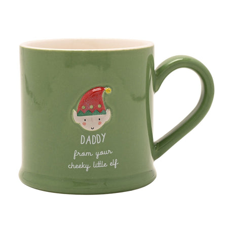 Green stoneware mug with embossed elf face in red glittery hat, printed "DADDY from your cheeky little elf" text, and a green handle on a white background.