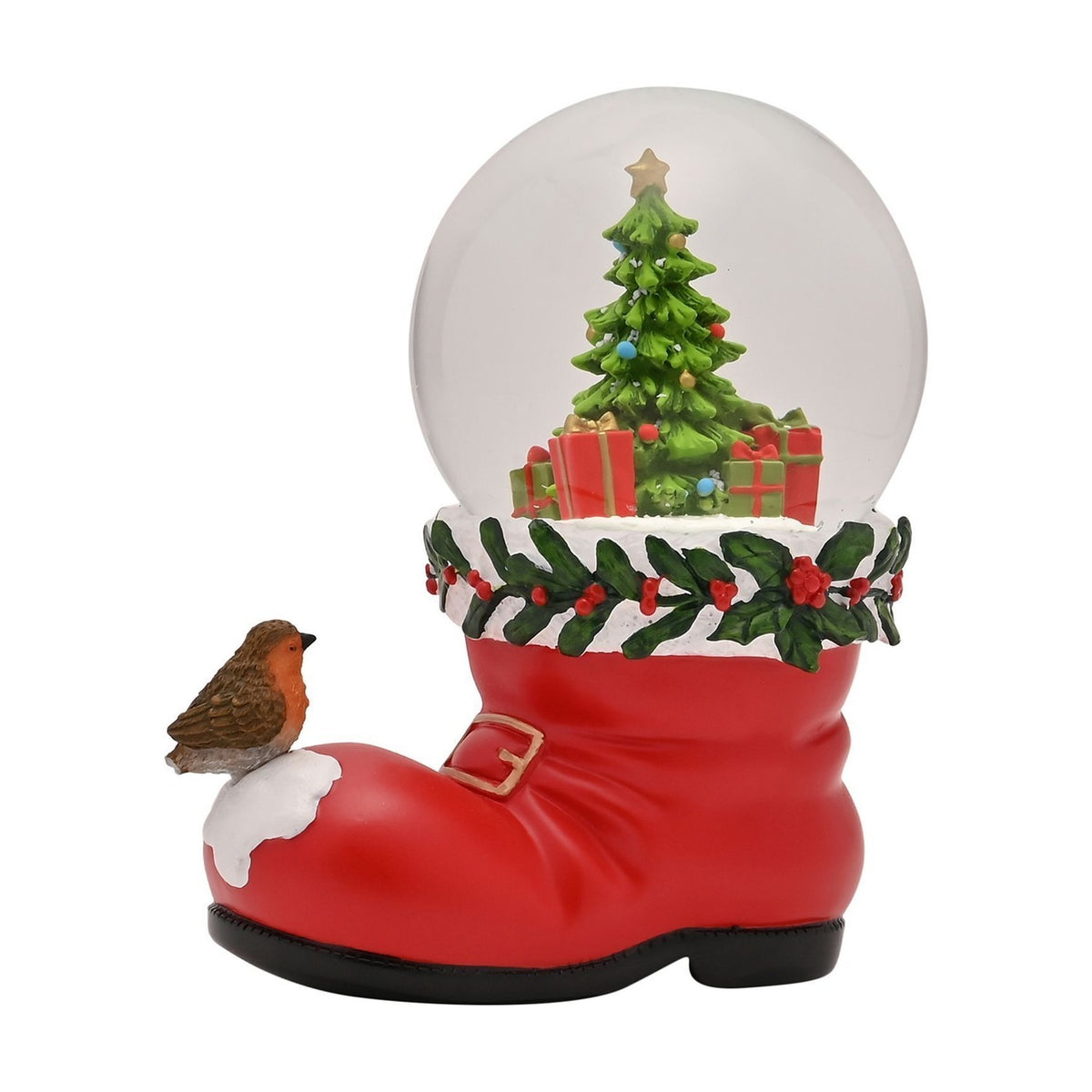 Red Santa boot snow globe with a robin on the toe and a glass dome showing a decorated Christmas tree and gifts, holly trim at the cuff, on a white background.