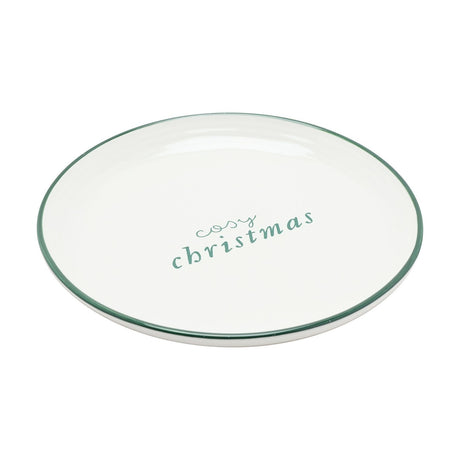Small round white stoneware Christmas plate with a fine green rim and "cosy christmas" lettered in green script at the centre, shown on a plain background.
