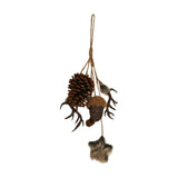 Brown hanging Christmas tree decoration with a pine cone, glittered acorn, sparkling antlers, a small bell and a furry star on a cord loop.
