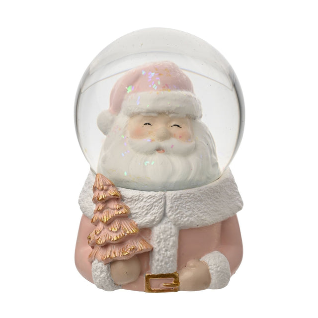 Smiling Santa glitter snow globe in pink, with white beard, pink hat, gold belt buckle and a gold-tipped pink Christmas tree, on a plain white background.