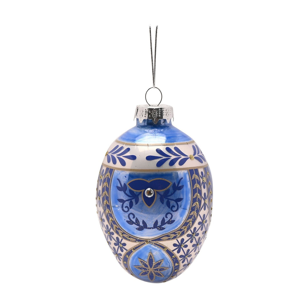 Oval painted glass egg Christmas tree decoration in blue and white, with gold leaf sprigs, a scrolling motif with clear sparkling stud, and a silver hanging loop, shown on a plain white background.