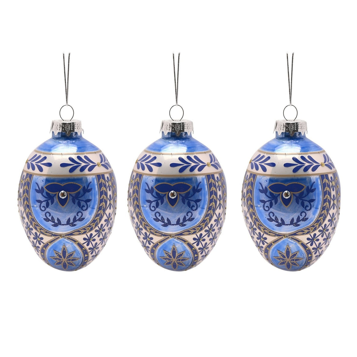 Set of 3 oval glass egg Christmas tree decorations in blue, each with white bands, gold detailing, scrolling motifs, a clear centre stud, and silver hanging loops, shown on a white background.