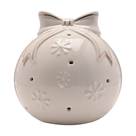 Bow Bauble LED Porcelain Light-Up Decoration in glossy white, round shape with a ribbon bow and gold-lined tails on top, raised snowflake details and light-up holes, on a plain white background.