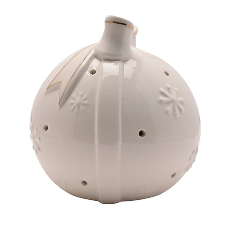 White glossy porcelain round bauble decoration with a ribbon bow top, gold-edged tails, raised snowflake details, and pierced light-up holes, on a plain white background.