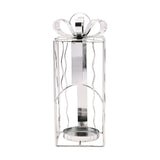 Silver iron tealight candle holder shaped like a Christmas present, with wavy wire sides, ribbon band, arched front opening, and a looped bow on top, shown on a white background.