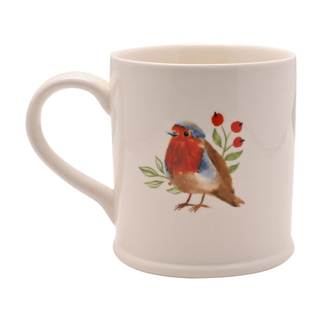 White stoneware mug with a watercolour-style robin, green leaf sprig and red berries design, featuring a curved handle and plain white background.