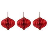 Set of three red paper honeycomb onion bauble Christmas decorations with gold-edged detailing, each hung by a red cord on a plain white background.