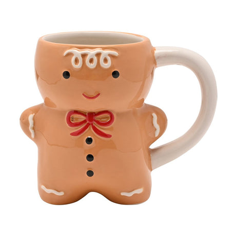 Gingerbread man shaped ceramic mug in light brown with white icing details, black dot eyes, a red bow, and a white handle, on a plain white background.