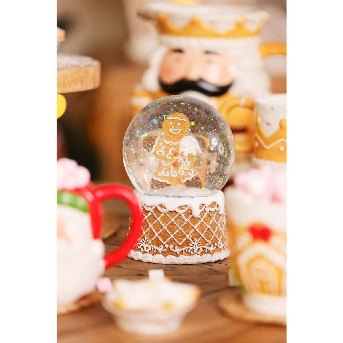 Gingerbread Man Resin Snow Globe with Iced Base 15cm - Brown
