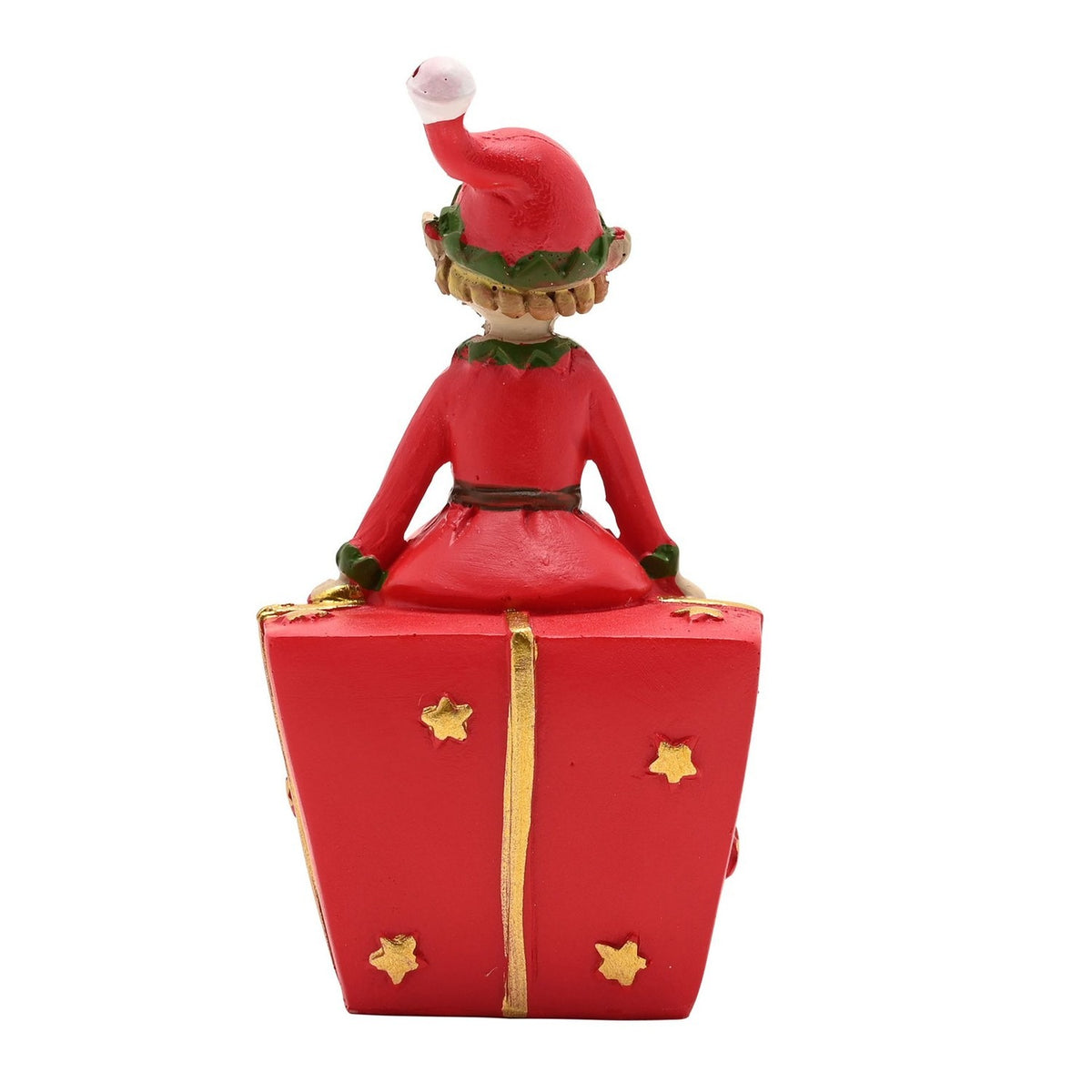 Jingle Elf on Present Christmas decoration, resin figurine in a red suit with green trim seated atop a red gift box with gold ribbon and stars, shown from behind on a white background.