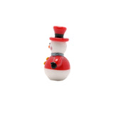 Miniature ceramic snowman figurine in red and white with a red top hat, blue striped scarf, yellow buttons and black mitten arm, shown on a plain white background.