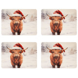 Set of 4 rectangular placemats featuring a Highland cow in a red Santa hat standing in a snowy, misty landscape, in brown and white tones.