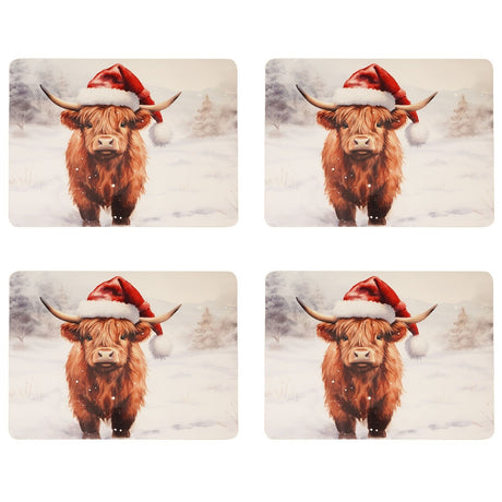 Set of 4 rectangular placemats featuring a Highland cow in a red Santa hat standing in a snowy, misty landscape, in brown and white tones.