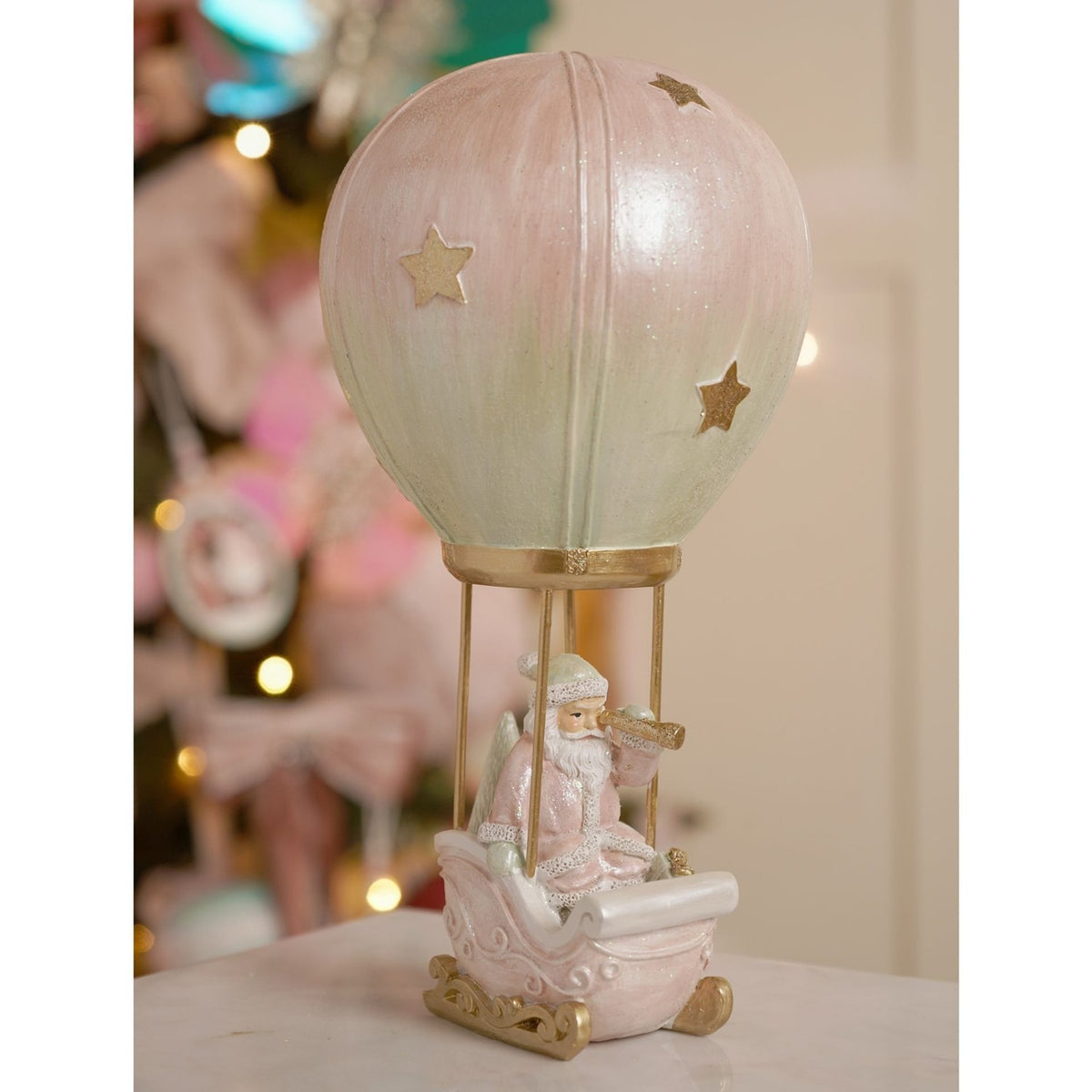 Santa Claus in Hot Air Balloon Resin Figurine - Pink & Green