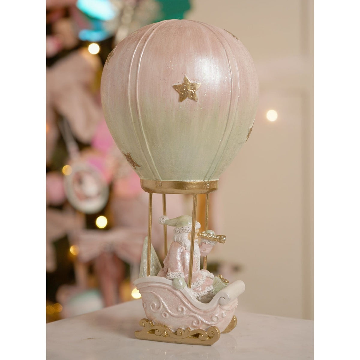 Santa Claus in Hot Air Balloon Resin Figurine - Pink & Green