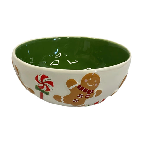 Round ceramic bowl, 15.7cm, glossy green interior, white exterior with raised gingerbread men, peppermint candies, and swirl lollipops.