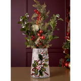 White crackle glass vase, 18.2cm, frosted finish with painted holly leaves, red berries and ribbon, holding a festive greenery and red berry arrangement against a dark wall.