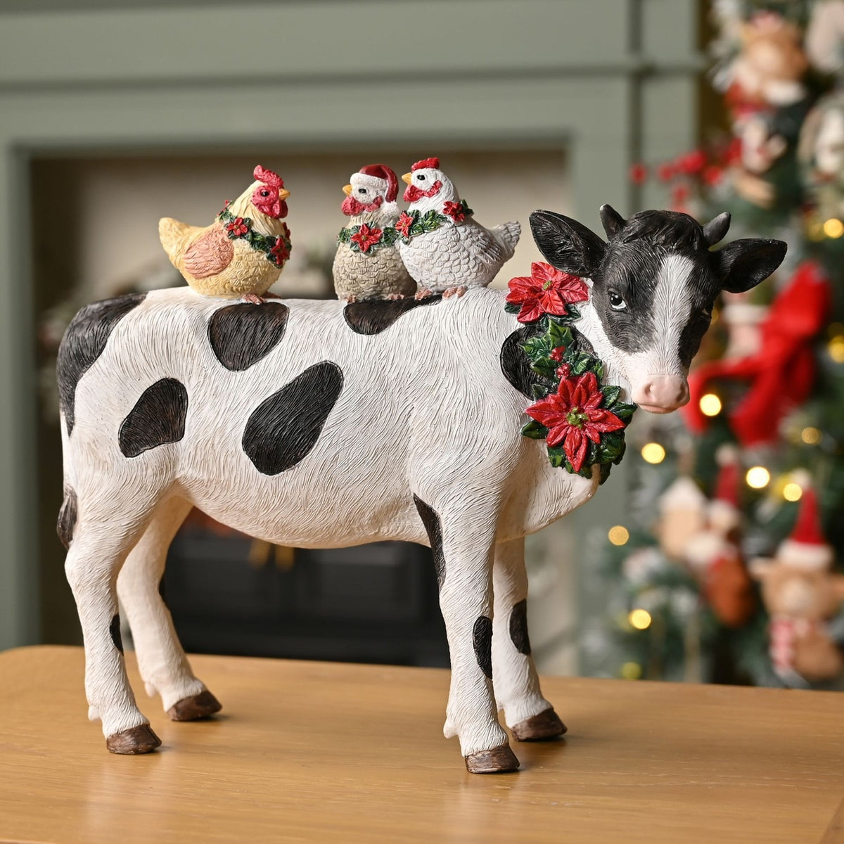Christmas Cow Figurine with Chickens on Back - White & Black