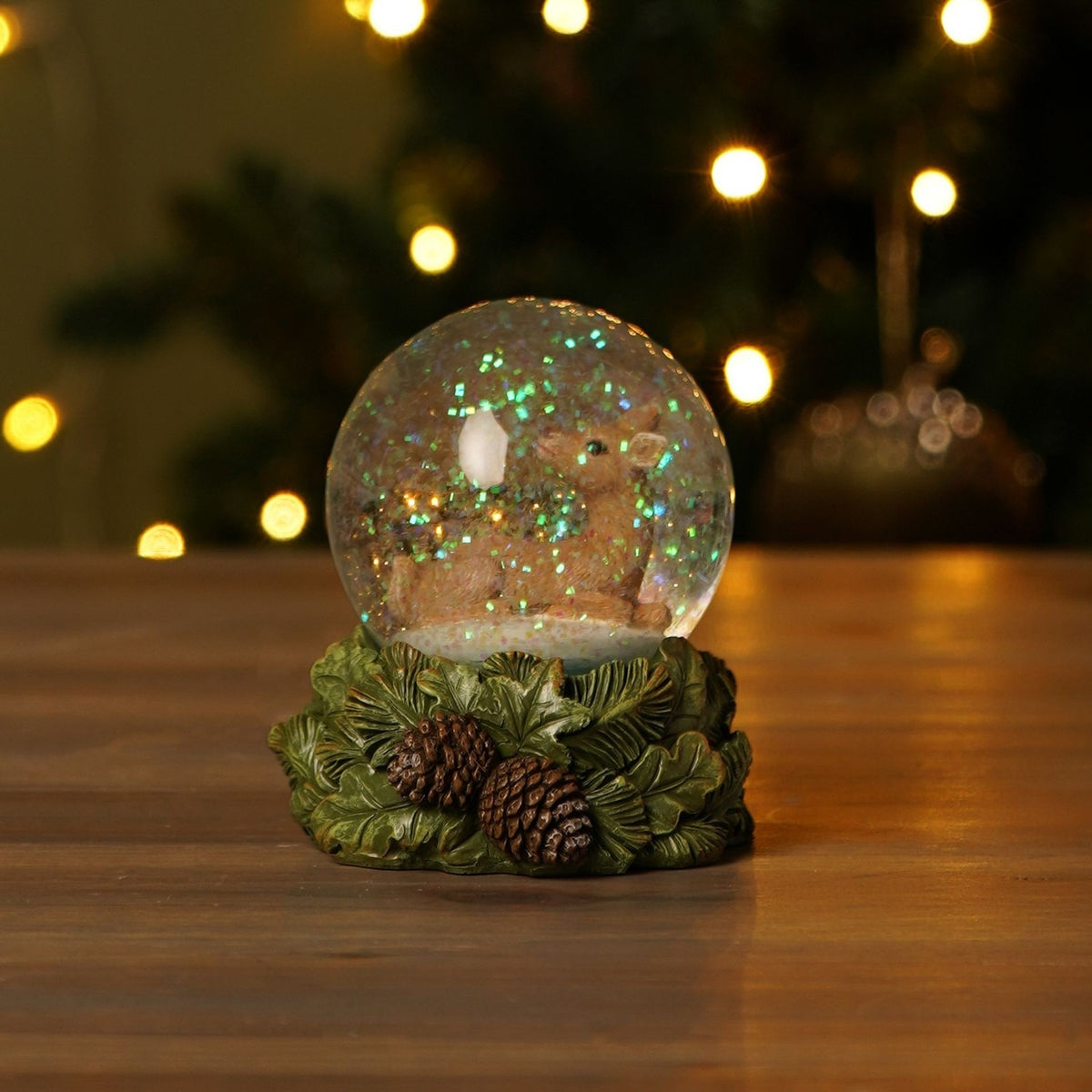 Resin Deer Snow Globe with Natural Leaf Base - Green & Clear