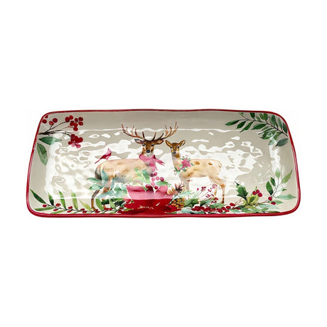 Rectangular ceramic serving plate, 35cm, in white with a red rim, featuring a stag and doe among winter foliage, berries and a red poinsettia, set on a plain white background.