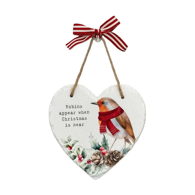 White wooden heart plaque with a red-scarfed robin, holly, berries and pine cones, reading "Robins appear when Christmas is near", hung by jute cord and a red striped bow.
