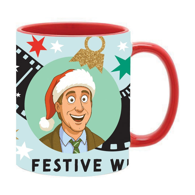 Stoneware mug 11oz with red interior and handle, featuring a cartoon man in a Santa hat in a mint green circle, surrounded by film strips, stars, a gold ornament, and festive text.