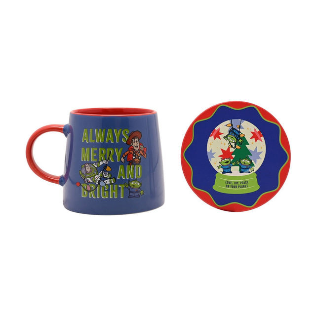 Toy Story Christmas mug and coaster set in blue porcelain, with red handle and interior, featuring Woody, Buzz Lightyear and aliens, plus a round red coaster with a snow globe design.